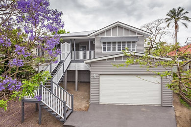 Example of a trendy gray exterior home design in Brisbane