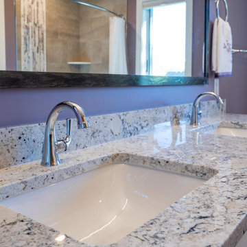 Modern Main Bathroom With a White Shaker Style Vanity and Lavender Walls