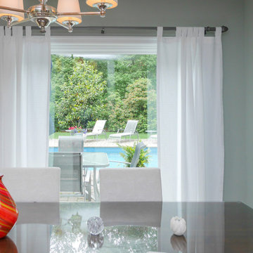 Modern Dining Room with Large Window - Renewal by Andersen