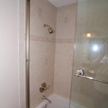 Kohler Devonshire Tub With Recessed Shampoo Shelf & Tall Shower Doors