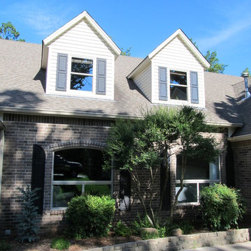 double hung windows above archtops with sliders