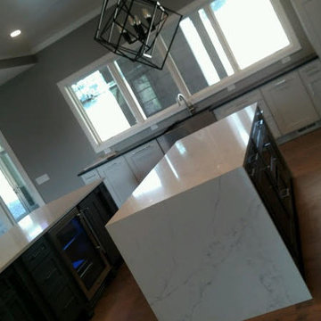 Brown Antique Leathered Granite with Calacatta Fantasy Quartz