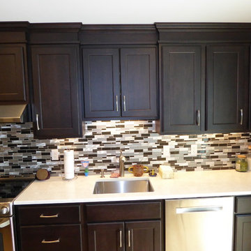Up close with undercabinet lighting, French Press alder, and Cirrus quartz