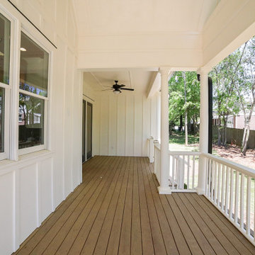 Spacious Covered Back Porch with Wainscoting