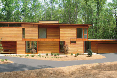 Garage - mid-sized modern attached two-car garage idea in Kansas City