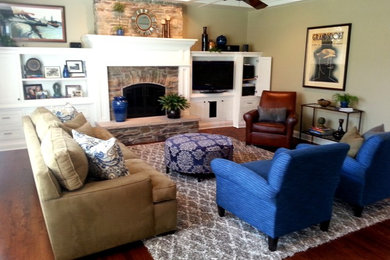 Inspiration for a mid-sized contemporary open concept medium tone wood floor and brown floor family room remodel in Chicago with brown walls, a standard fireplace, a stone fireplace and no tv