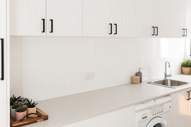 Design ideas for a mid-sized beach style dedicated laundry room in Canberra - Queanbeyan.
