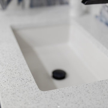 Bathroom remodeling in Columbia, MD with double vanity & marble bathtub