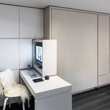 Visite Privée : Un 21 m² optimisé grâce à un mur de rangement