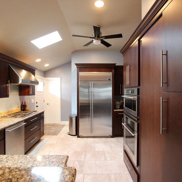 Transitional Cherry Kitchen with Tempered Rain Glass Backsplash
