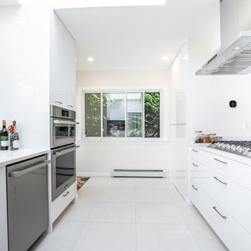 Contemporary Galley Kitchen with Integrated Appliances – Kerrisdale Vancouver Re
