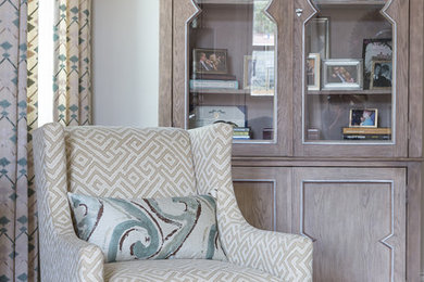 Example of a mid-sized eclectic open concept medium tone wood floor living room design in New Orleans with beige walls and a tv stand
