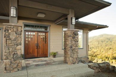 Example of a large arts and crafts beige two-story wood exterior home design in San Francisco