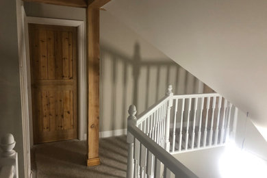 Respray of dark stained staircase in a country cottage