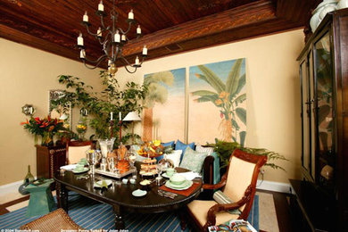 Mid-sized island style dark wood floor and brown floor enclosed dining room photo in Miami with beige walls and no fireplace
