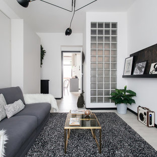 Photo of a scandinavian living room in Melbourne with white walls, light hardwood floors and beige floor.