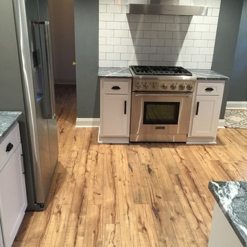 cabinet refacing-- white with soapstone countertops and subway tile backsplash