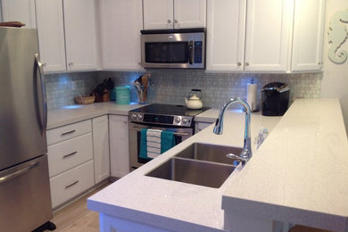 Example of a beach style kitchen design in Jacksonville