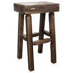Montana Wood work - Montana Homestead Half Log Barstool In Stain And Clear Lacquer MWHCBNHLSL - Handcrafted in Montana, this unique "half log" barstool features genuine lodge pole pine, mortise and tenon joinery and time honed skills to ensure a true heirloom quality item. The master craftsmen at Montana Woodworks carefully select the raw material for the barstool, choosing only the finest of logs to create this special barstool. The artisans rough saw all the timbers and accessory trim pieces for a look uniquely reminiscent of the timber-framed homes once found on the American frontier. This simple yet elegant barstool will bring rustic beauty to any room of your home. Perfect for the bar, the bistro table or anywhere a touch of rustic completes the scene. This item comes professionally pre-finished with three coats of premium grade, stain and clear lacquer. Capacity 350 pounds. Comes fully assembled. This item comes professionally finished with premium grade stain and lacquer. 20-Year limited warranty included at no additional charge. Made in Montana, U.S.A. Seat Width is 18", Depth is Approximately 10". Some variation in seat depth may occur as real trees are used to create this product!