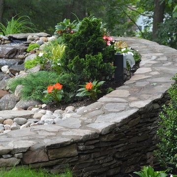 Pond with Bluestone Patio and Pennsylvania Flat Wall