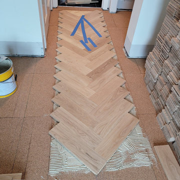 Herringbone Installation in Progress — Corridor, Field and Border Taking Shape