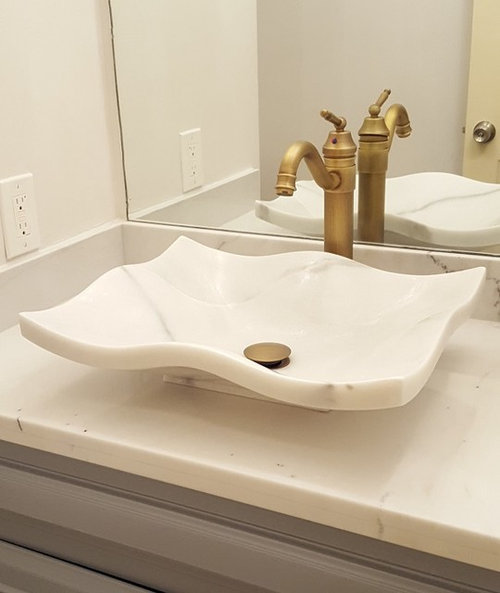 off white vessel sink