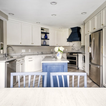 Navy Stained Island, Hood vent and Floating Shelves in White Shaker Kitchen