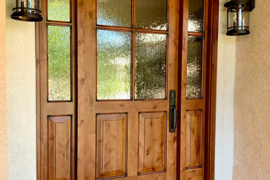 Design ideas for a contemporary front door in San Francisco with a single front door and a medium wood front door.