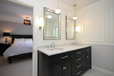 Bathroom - mid-sized transitional master white tile and mosaic tile marble floor bathroom idea in Ottawa with an undermount sink, shaker cabinets, dark wood cabinets, marble countertops and white walls