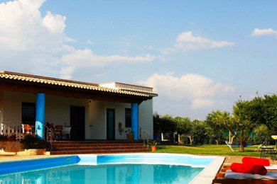 Inspiration for a large backyard custom-shaped pool remodel in DC Metro