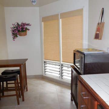 Jalousie windows are common in the South Pacific, woven wood roman treatments ca