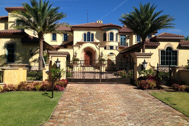 Tuscan exterior home photo in Tampa