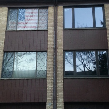 aluminum window replaced with two tone vinyl R5 windows and patio slider doors.
