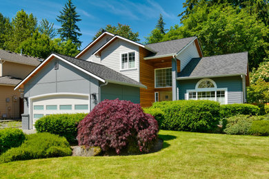 Mid-sized transitional two-story mixed siding house exterior idea in Seattle