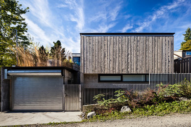 This is an example of a contemporary concrete exterior in Vancouver.
