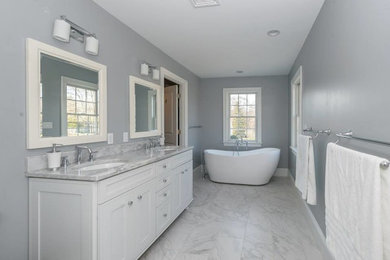 Example of a transitional bathroom design in Boston