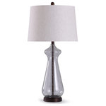Stylecraft - Allen Seeded Glass Table Lamp With Tapered Drum Shade, Oil Rubbed Bronze - Mixed materials create a striking visual in the Allen table lamp. Clear glass and steel form the curving body, with an oil-rubbed bronze finish exaggerating the visual contrast between the substances. An oatmeal shade made of polyester and linen adds an elegant touch, making this a strong transitional piece for living rooms, offices and foyers.