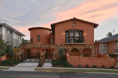 Design ideas for a mediterranean home design in Newcastle - Maitland.