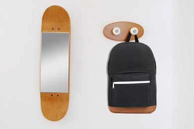 Skateboard mirror and coat rack for backpack school