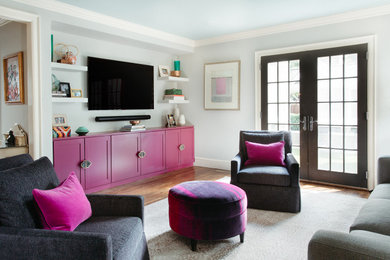 Example of an eclectic family room design in Charlotte