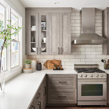 Warm, Contemporary Kitchen with Kitty Hawk Door Style