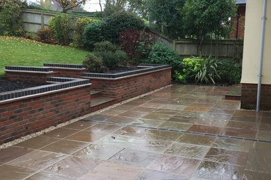 Design ideas for a traditional patio in Hampshire.