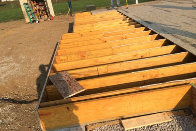 Applying adhesive to decking to prevent floor squeaks