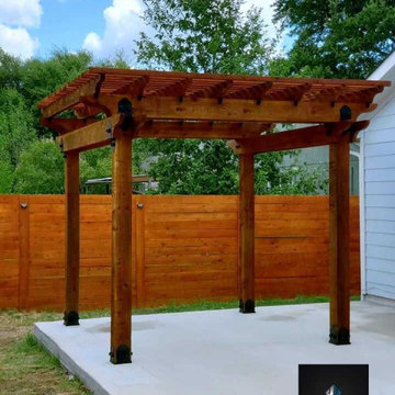 Pergola and Limestone Slab Patio and trashcan Walkway