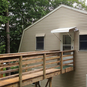 A White Aluminum Door Canopy on a unique entryway