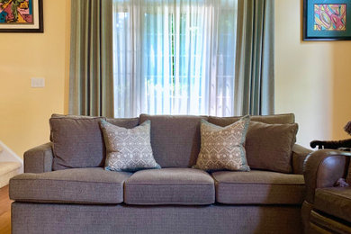 Example of a transitional family room design in DC Metro
