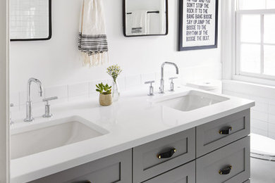 Bathroom - transitional white tile and subway tile multicolored floor bathroom idea in New York with shaker cabinets, gray cabinets, white walls, an undermount sink and white countertops