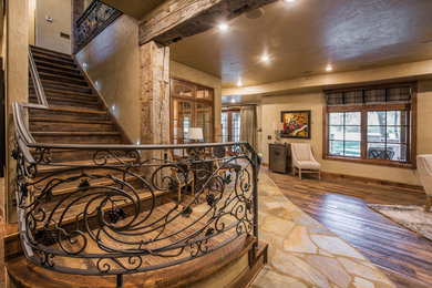Mid-sized mountain style wooden straight metal railing staircase photo in Other with wooden risers