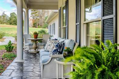 Transitional porch photo in Other