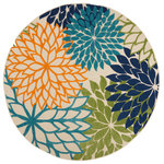Nourison - Nourison Aloha ALH05 Multicolor Round 7'10" x 7'10" Area Rug - This outdoor rug from the Aloha Collection features soft cut pile and textural woven patterns in bursts of brilliant color sure to liven any outdoor space. Oversized floral patterns in blue, orange, green, navy, and camel add a festive touch of the tropics to your patio or deck. Created from premium stain-resistant fibers for long wear, low maintenance, and a splendid texture.
